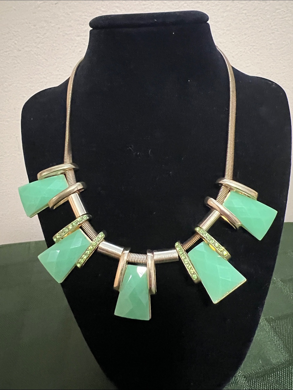 Green Statement Necklace features five trapezoidal cabochons
